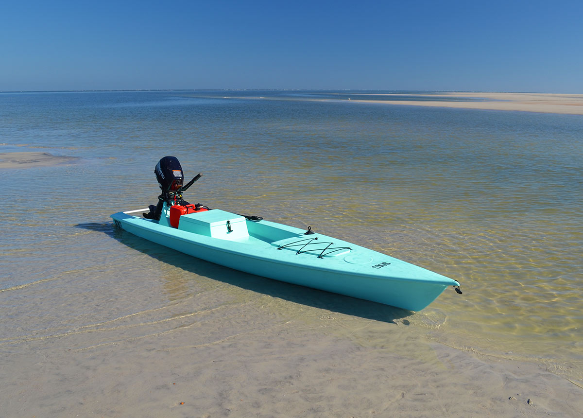 fishing kayaks on the sandbar in ocean