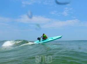 solo skiff jumping waves