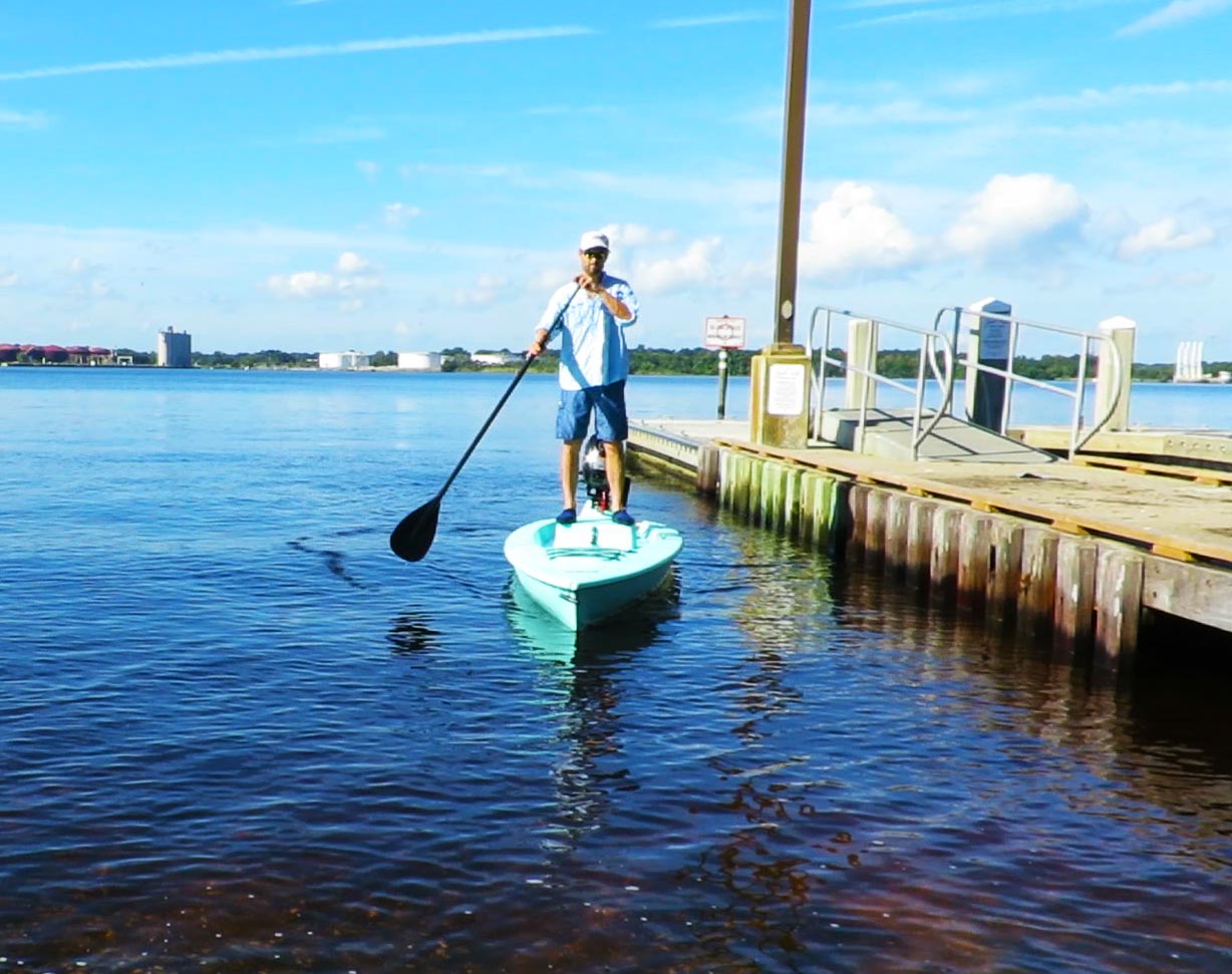 Solo Skiff paddling at dock