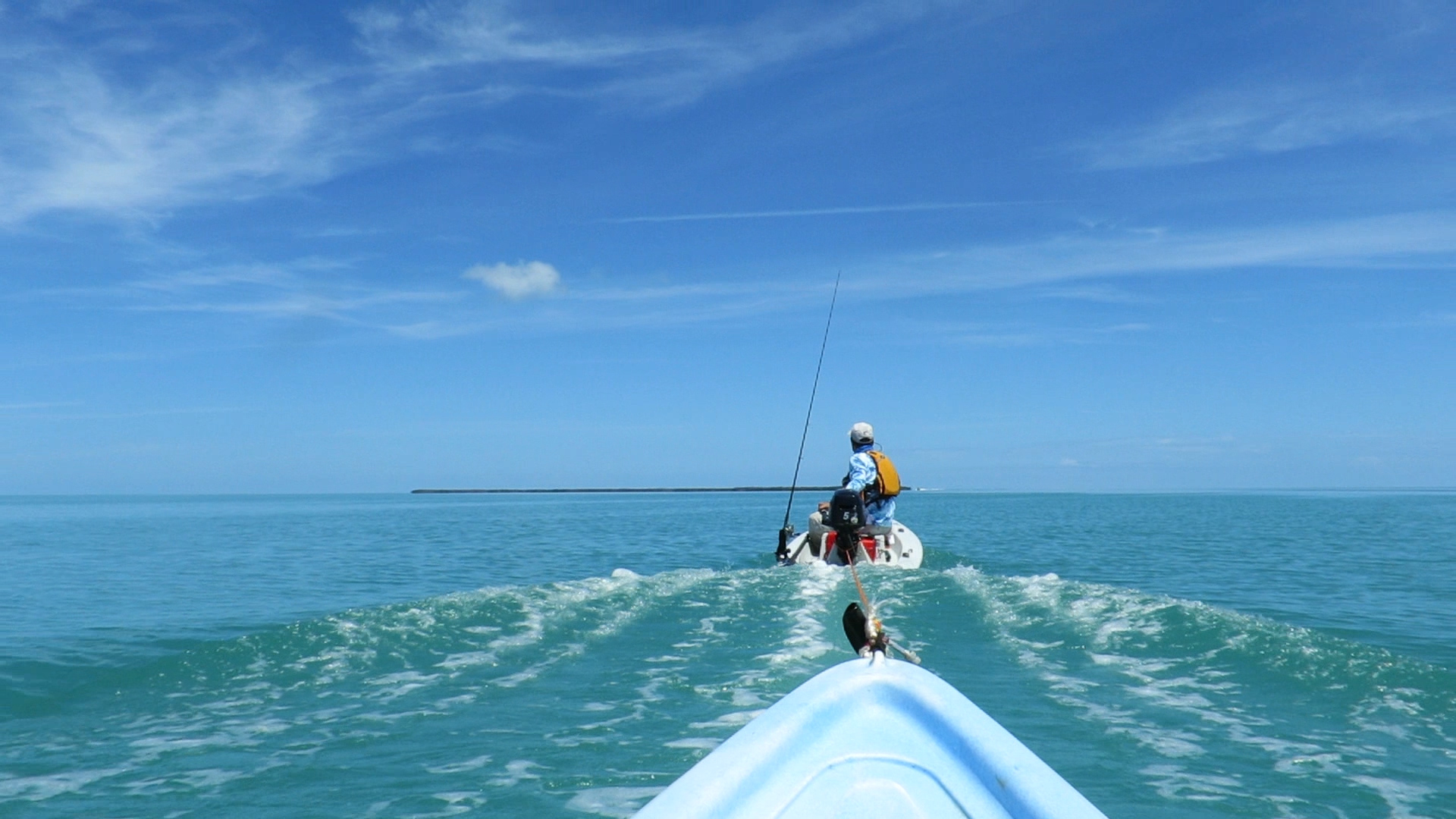 Solo Skiff towing a kayak