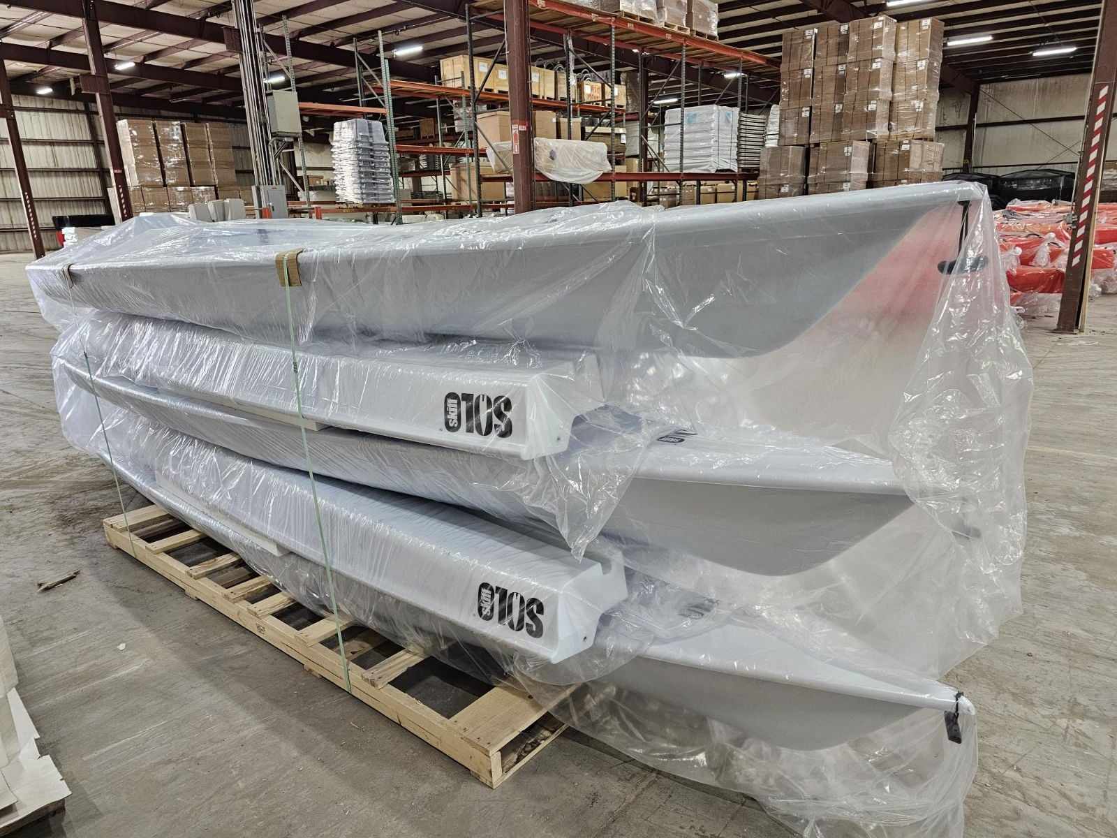 Solo Skiffs ready to ship on pallet